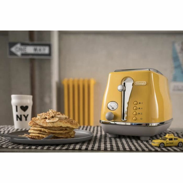DeLonghi Icona Capitals Leivänpaahdin 900W, Keltainen - Vuodevaatteet.fi