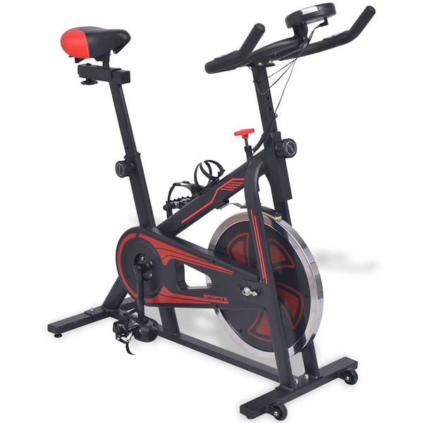 Heimtrainer mit Pulsmessgeräten schwarz und rot