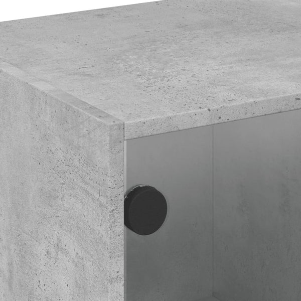 Betongrauer Couchtisch Milintu 68x50x42cm (mit Glastür)
