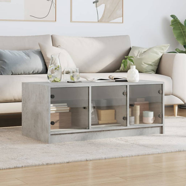 Betongrauer Couchtisch Lura 102x50x42cm (mit Glastür)