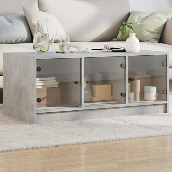 Betongrauer Couchtisch Lura 102x50x42cm (mit Glastür)
