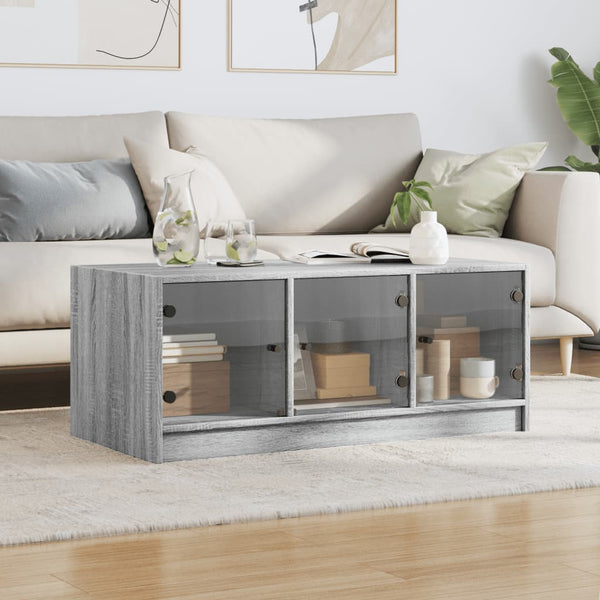 Grauer Couchtisch Lura 102x50x42cm (mit Glastür Sonoma)