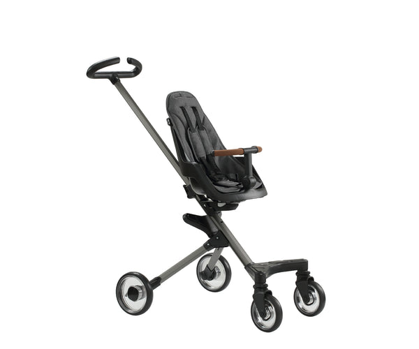 Qplay Easy -lastenvaunut 3-in-1 harmaana, jossa on säädettävä työntöaisa ja turvakaari.